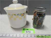 Jar of marbles and a canister