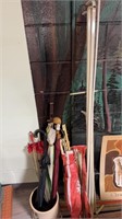 Umbrellas and curtain rods lot