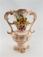 Floral vase with handles, embossed with delicate r