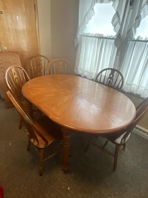 Wooden table and 6 chairs