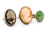 A group of three gem set silver rings