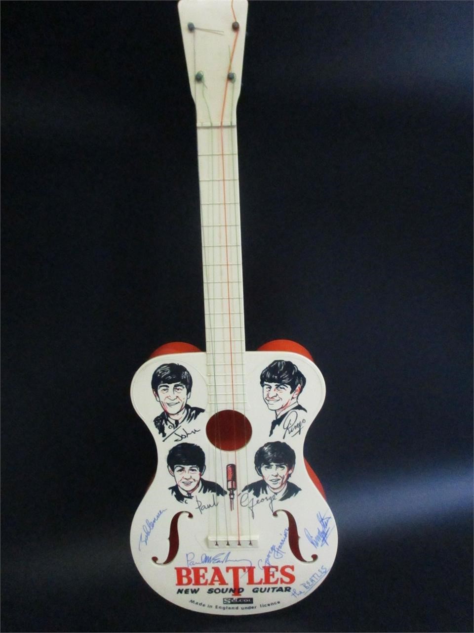 The Beatles Signed Selcol Toy Guitar