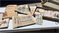 Old clothes patterns & newspapers