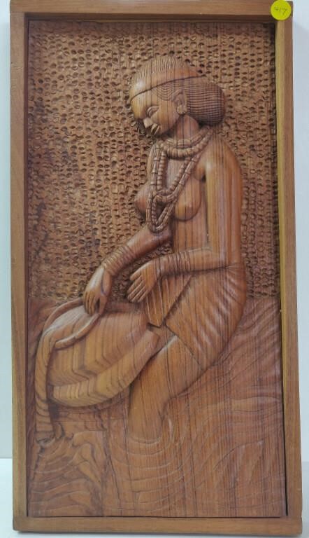 Wood Carving Artwork of A Woman in the Water