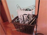 Laundry basket w/hangers.