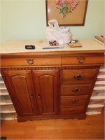 Wood cabinet w/contents. (linens)