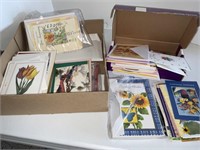 Box full of assorted new cards