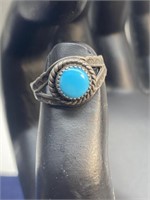 Size 4 sterling silver ring turquoise center