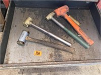 Heavy hammers of various sizes and weights