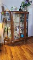 CURVED GLASS CURIO 45"X40X13"(no contents)