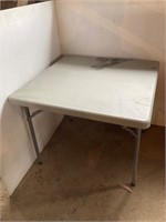 4ft x 4ft poly resin folding  table for the shop