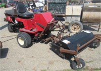 Toro power broom with hydraulic lift and rotation