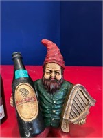 Leprechaun Holding a Guinness Bottle, Seated or