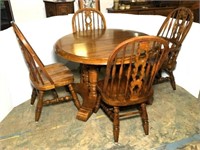 Oak Round Dining Table with Spindle Back Chairs