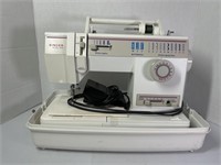 Singer 9410 Sewing Machine and Craft Materials