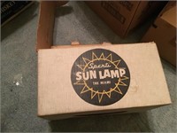 Antique sun lamp still in original box