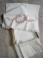 C9) 2 old embroidered pillow cases. Butterfly and