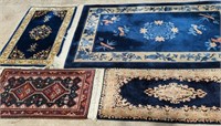 Collection of 4 Persian and Oriental Rugs