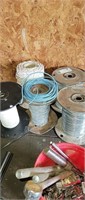Rolls of electric wire and fence wire