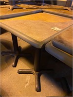 Two 2 seater tables green tan color w/ bases 20x24