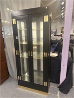 Black and gold curio cabinet
