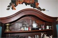 Top shelf of cabinet , vases, candle holders ,