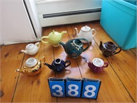 BOX WITH COLLECTION OF TEA POTS