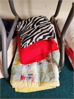 Red Blanket, Floral Quilt and Zebra Stripe Neck