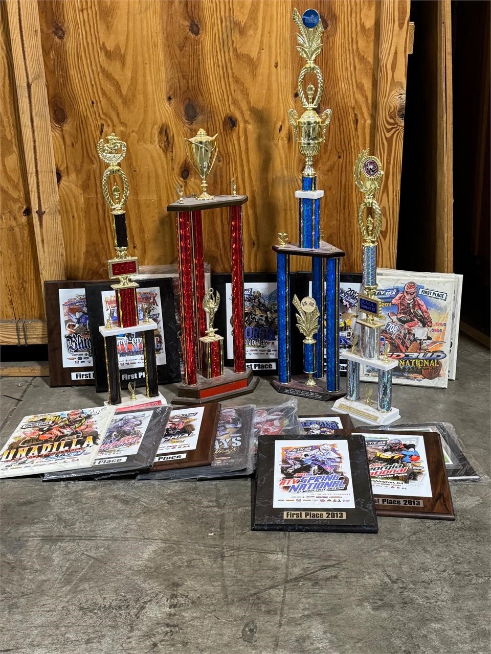 Four wheeler racing trophies and plaques