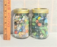 two jars of marbles