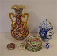 Two oriental vases, 2 lidded jars