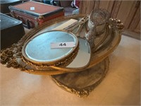 Stack of Mirrored Vanity Trays with Combs,