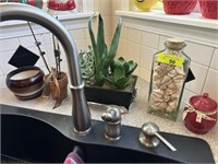 Shells & misc behind sink