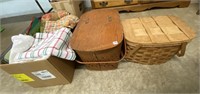2 picnic baskets w/table clothes & place mats