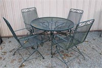 Round Outdoor Metal Table & 4 Rocking Chairs