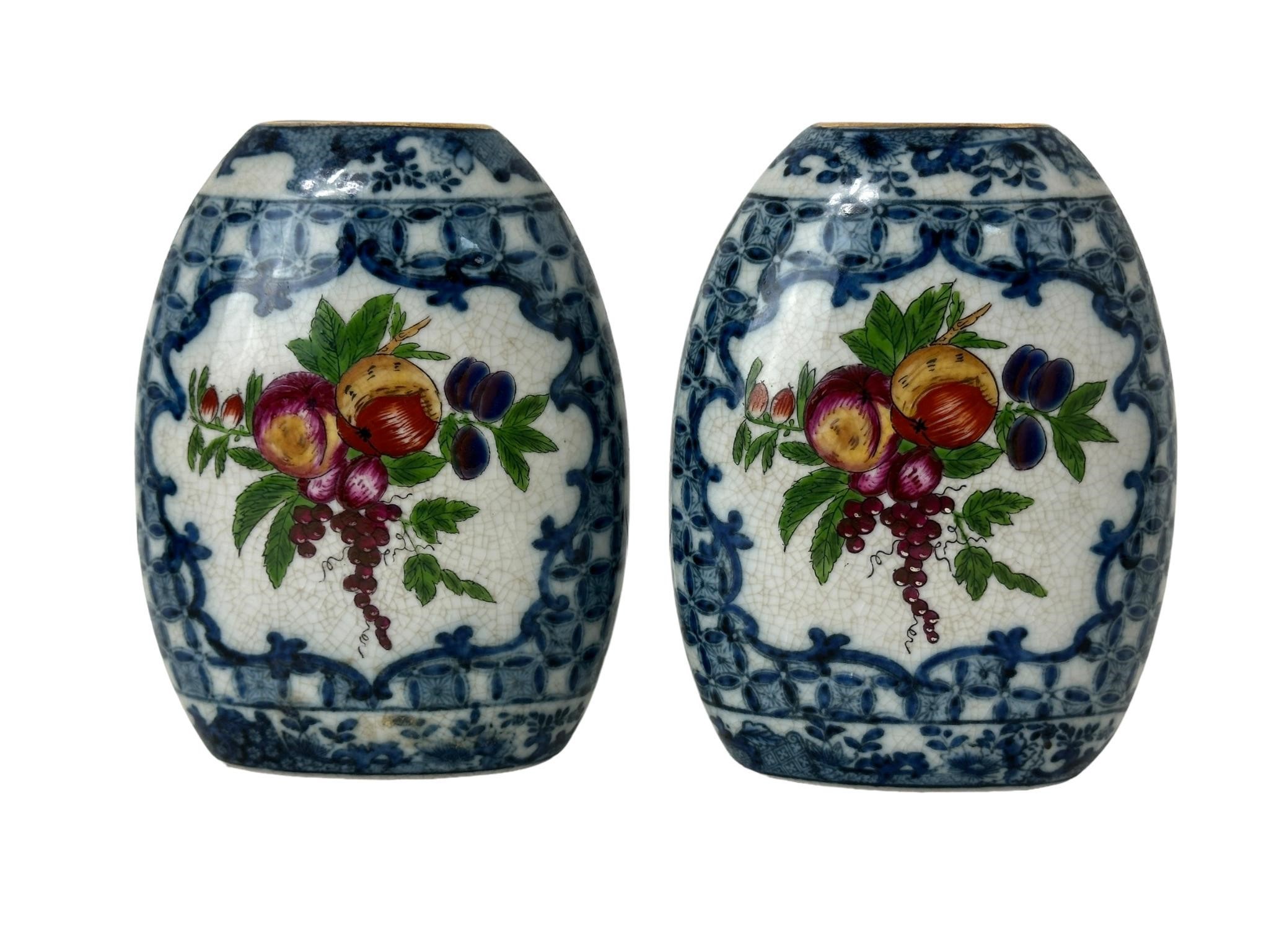 Pair of United Wilson Vases