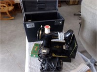 Vintage Singer sewing machine with case and acc.