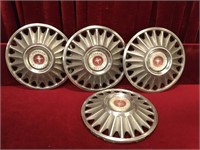 4 Vintage Ford Mustang Hubcaps