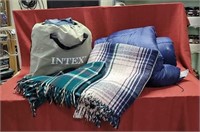 Air mattress, blankets, and sleeping bag