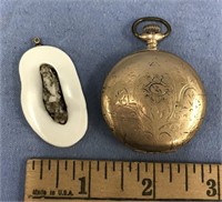1.5" Ivory pendant and a brass pocket watch   (a 7