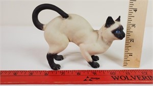Siamese cat porcelain figurine.