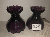 Unmarked plum candlesticks