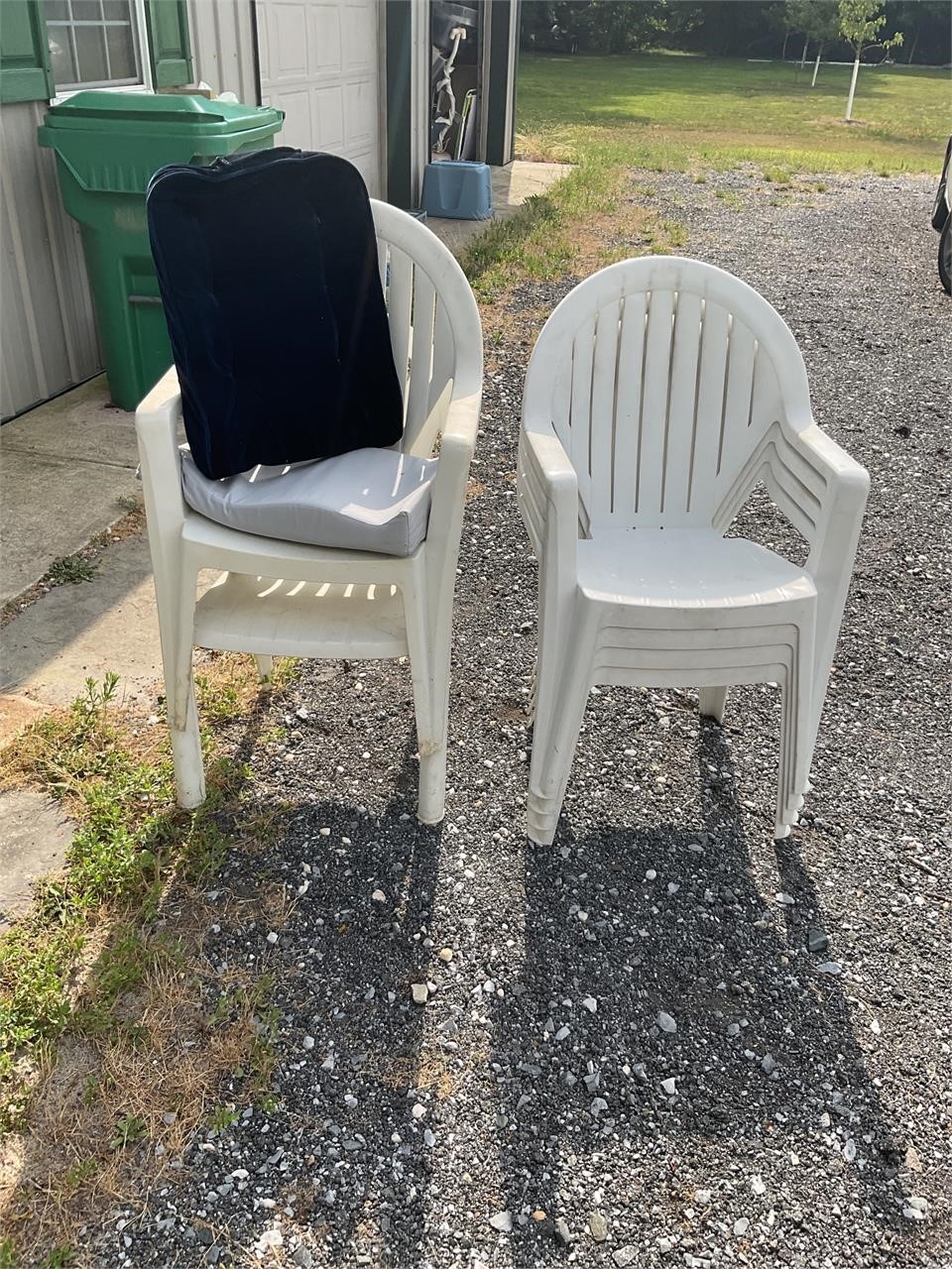 White plastic outdoor chairs