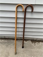 Two Wooden Canes 35" And 33 3/4" Tall