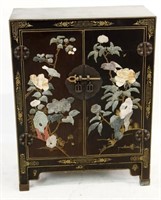 Ebonized  Chinese cabinet with hard stone relief