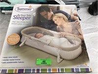 Small baby bed new in box and a baby stroller
