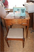 Singer sewing machine and cabinet with stool