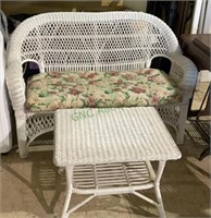 Wicker love seat with fabric cushion seat and