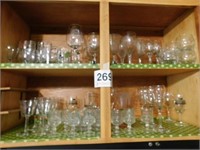 Two shelves of cordials - wine - other bar glasses