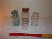 4 canning jars-includes one with blue lid